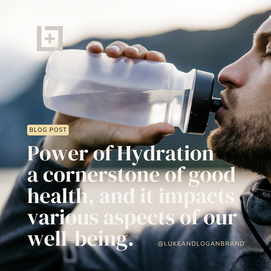 man drinking water while outdoors